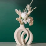 Levvohd Off White Hollow Ceramic Vase Set of 2, Round Modern Vase for Nordic Minimalist Book Style Shelf Decor.